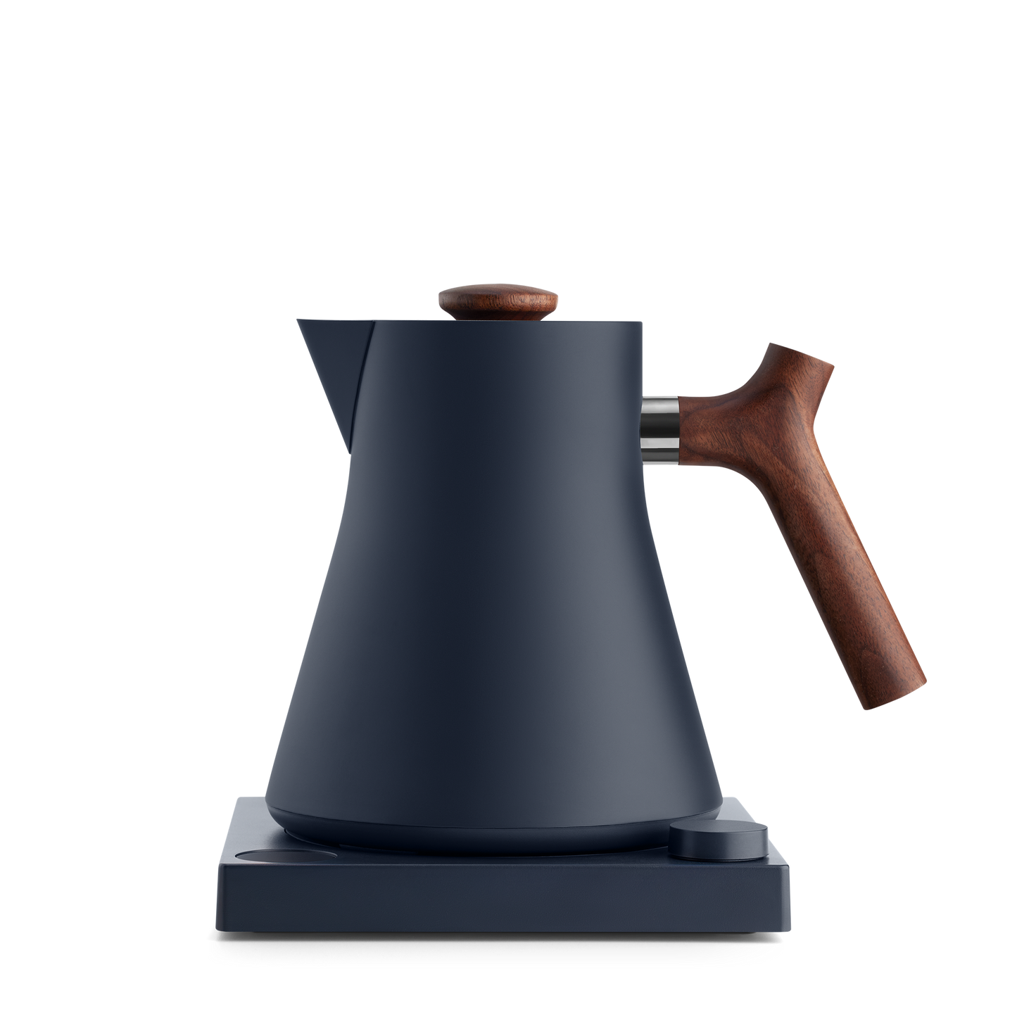 The Corvo EKG Electric Kettle by Fellow Wholesale is a sleek, matte black appliance featuring a wooden handle and knob, positioned elegantly on its matching base. Precision engineered with a modern, minimalist design, it showcases clean lines and a smooth surface. The base is equipped with a variable temperature control dial located on the front-right corner.