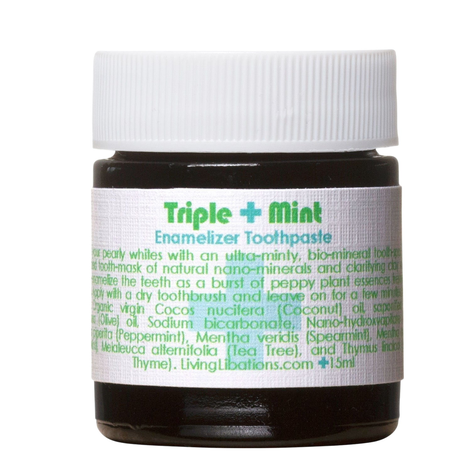 A small jar of Triple Mint Enamelizer Toothpaste from Living Libations highlights its organic ingredients, which include nano-hydroxyapatite, coconut oil, spearmint, and essential oils of tea tree and thyme.