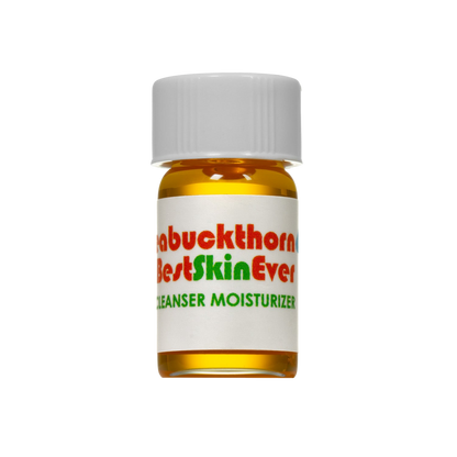 A small glass bottle with a white cap contains a golden liquid. The label features the product name "Best Skin Ever Cleanser - Seabuckthorn" by Living Libations in red and green text. Enriched with botanical compounds, the design is simple and focuses on emphasizing the product name.