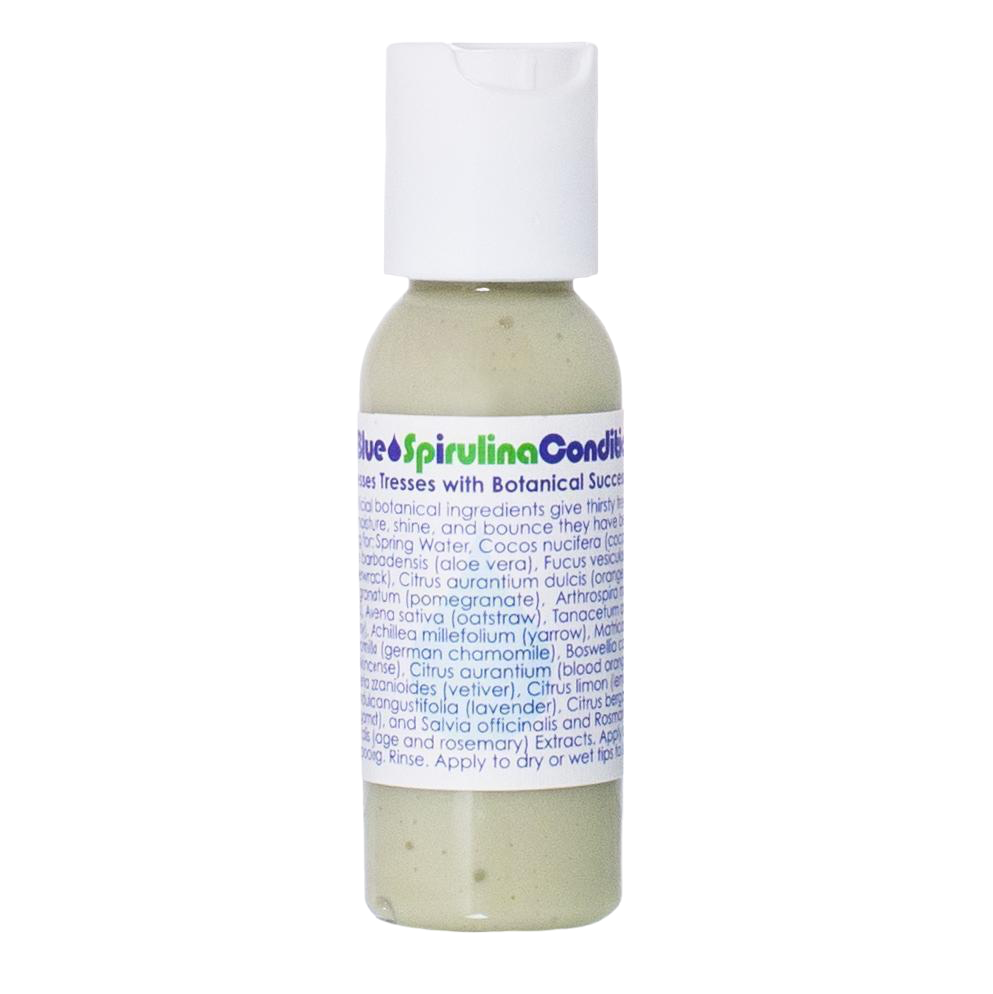 A small, transparent bottle of Living Libations' True Blue Spirulina Conditioner, designed for dry hair and enriched with azulene essential oils, contains a greenish-tinted liquid. The bottle features a white flip-top cap and a label that lists the ingredients and usage instructions, both adorned with blue and green accents.