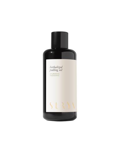 A dark-colored bottle with a black cap, labeled "Herbalized Pulling Oil." The minimalist design features clean lines with the word "Surya" written in a stylized font at the bottom of the label, emphasizing its roots in Ayurveda and traditional oil pulling practices.