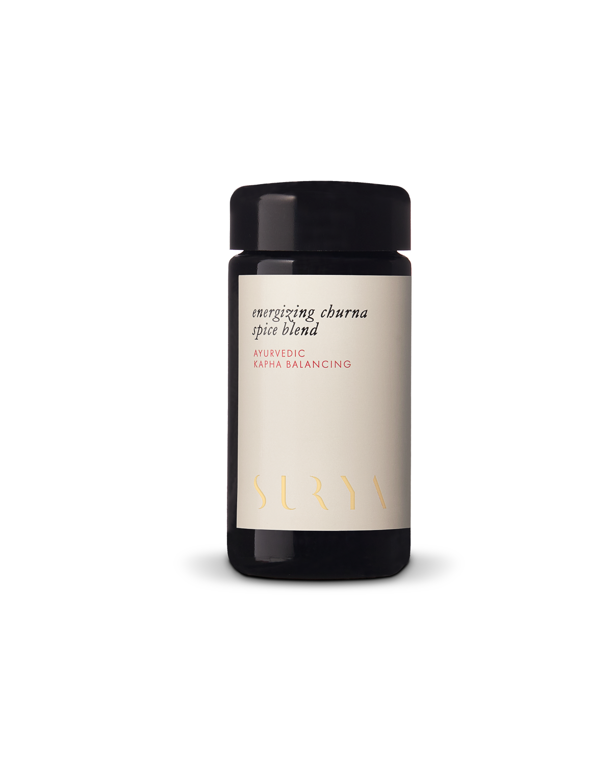 A dark-colored jar with a black lid containing "Energizing Digestive Spice Blend" from the esteemed brand Surya, featuring the label text "Ayurvedic Kapha Balancing." Made with organic ingredients, the jar is set against a gradient background.