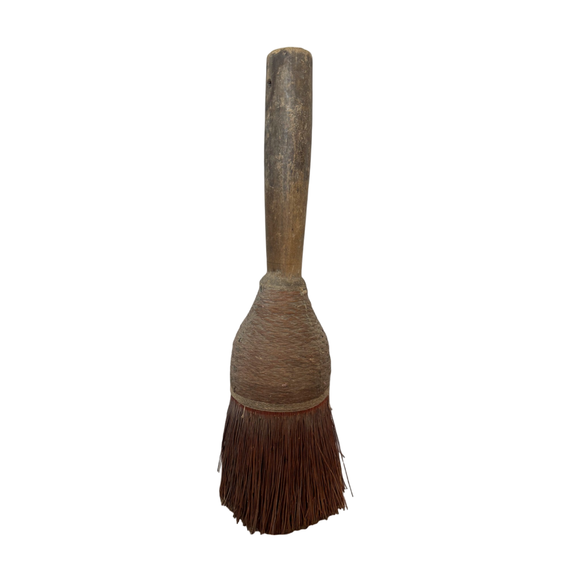 The Antique Hearth Brush I by Shoppe Maison features a vintage wood handle with coarse, sturdy bristles, likely used for cleaning or dusting. The handle displays signs of wear and age, while the overall design is simple and rustic against a black background.