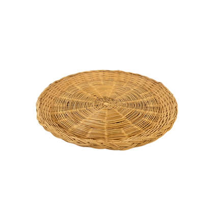 This set of 4 Vintage Woven Plate Holders by Shoppe Maison features round, flat wicker baskets with an intricate woven design in a natural brown hue. Shown empty against a plain black background, they evoke the charm of unique vintage homewares.