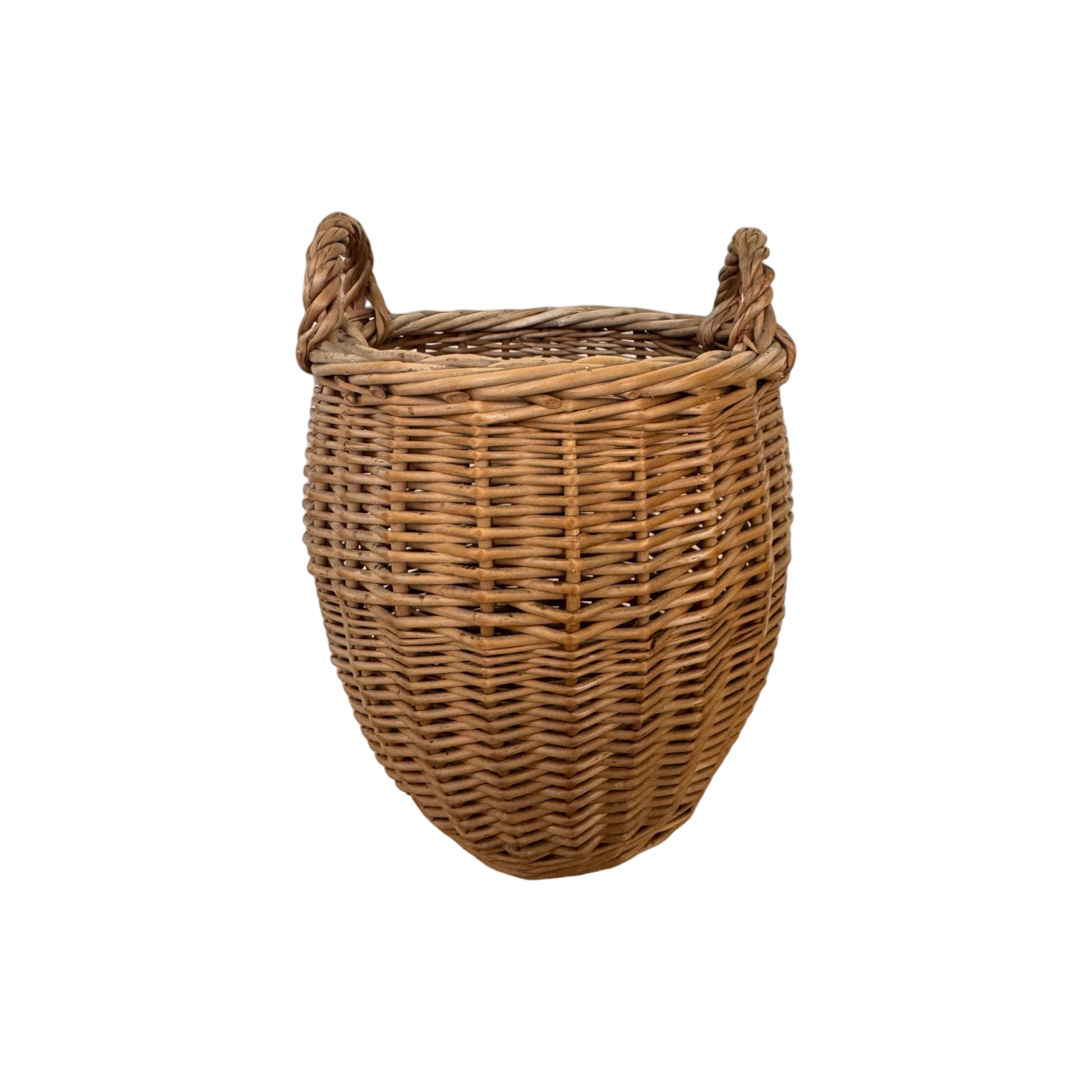 The Small Vintage Basket with Handles from Shoppe Maison showcases a round, woven wicker design complete with two curved handles on either side. Set against a plain black background, it accentuates the natural rustic texture and exemplary craftsmanship of quality homewares.