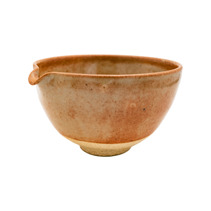 Discover the Katakuchi Matcha Tea Bowl by Chafinity Tea. This ceramic bowl, in earthy tones of brown and beige, features a rounded shape and a smooth, shiny glaze. Its small, subtle spout is ideal for easy pouring. Perfect for enhancing your Chafinity Tea moments against a plain black background.