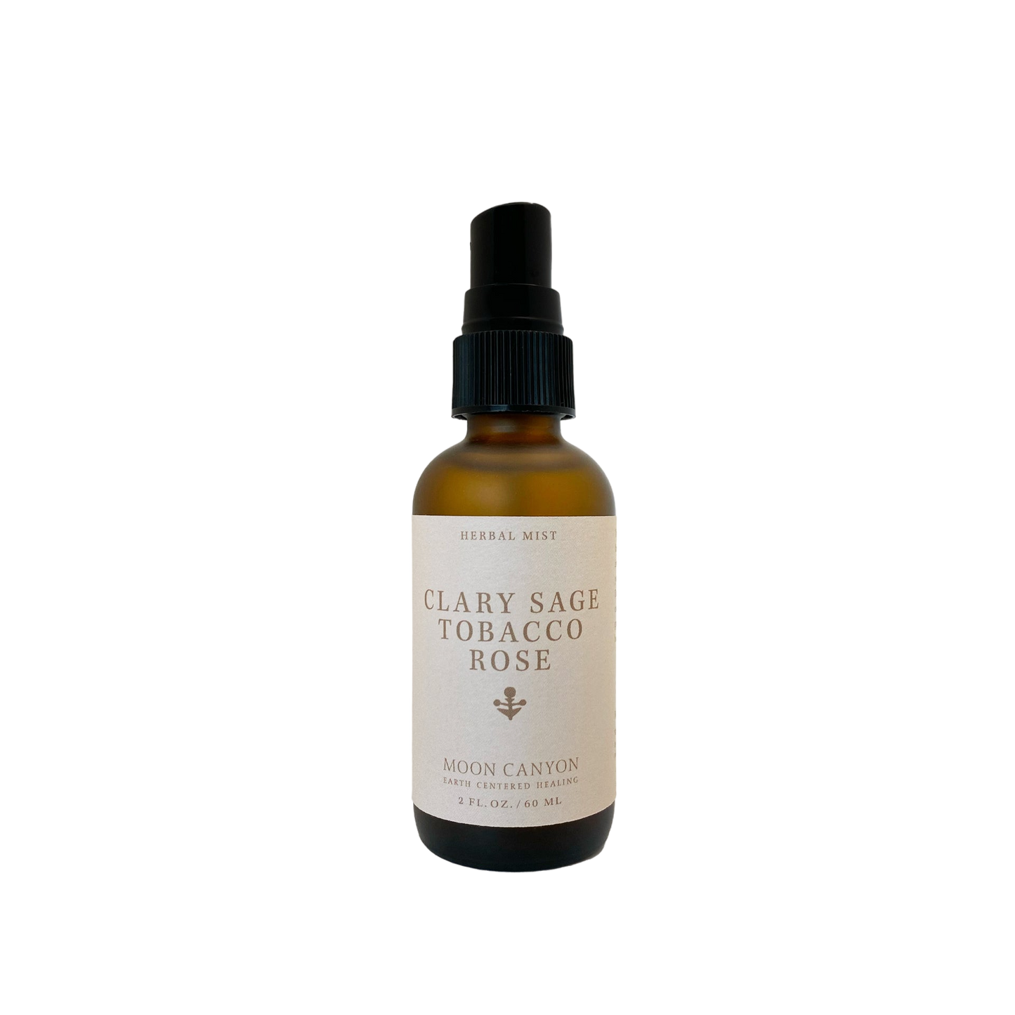 A brown bottle with a black spray nozzle labeled "Clary Sage, Rose & Tobacco Herbal Mist" by Moon Canyon Healing, containing 2 fl oz (60 ml) of liquid in an energetic mist. The bottle is set against a black background.