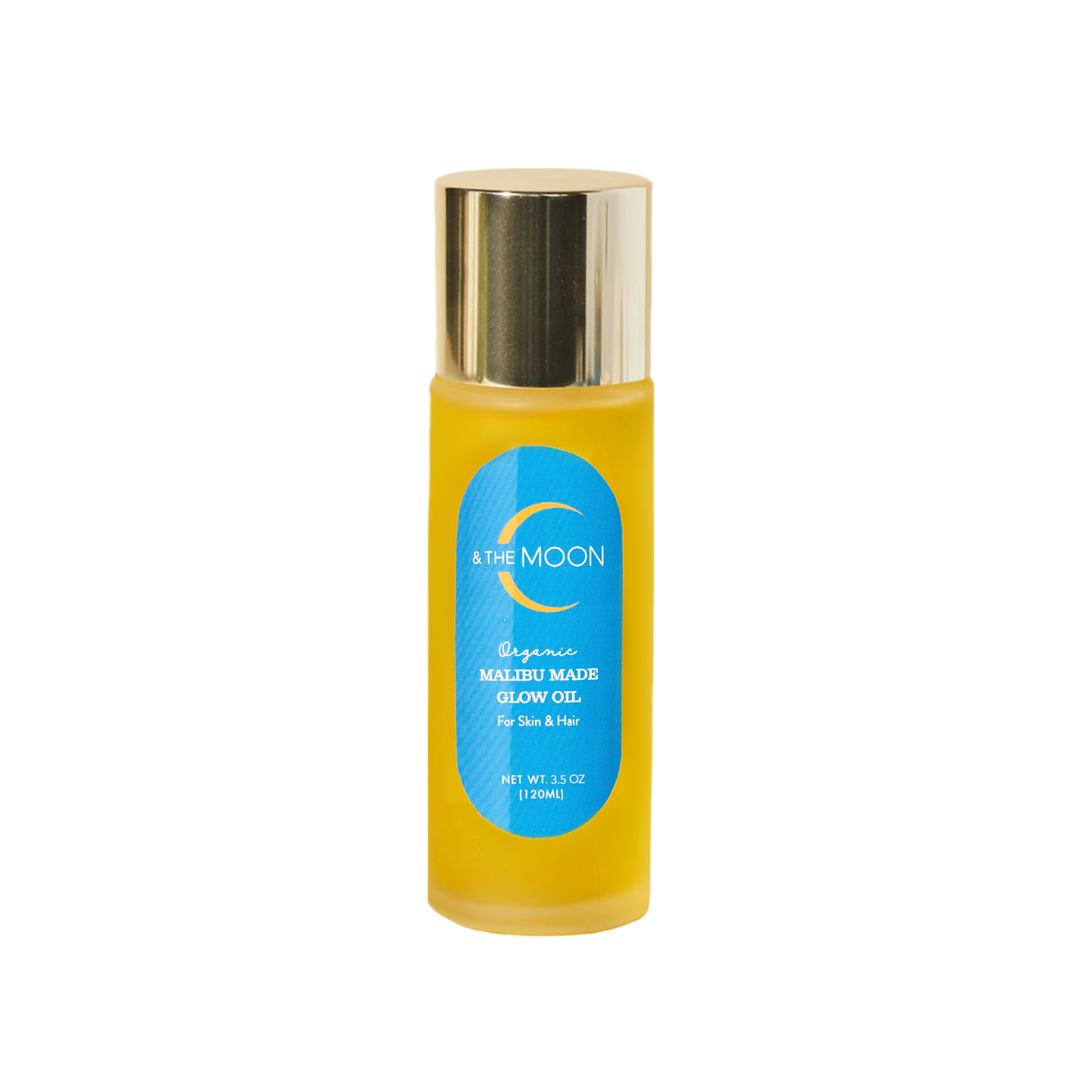 A bottle of "Malibu Made Glow Oil" by C & The Moon, perfect for a clean skincare routine. This cylindrical bottle filled with yellow liquid features a shiny gold cap. The blue label indicates the organic oils are suitable for skin and hair, with a net weight of 3.8 ounces (112 mL).