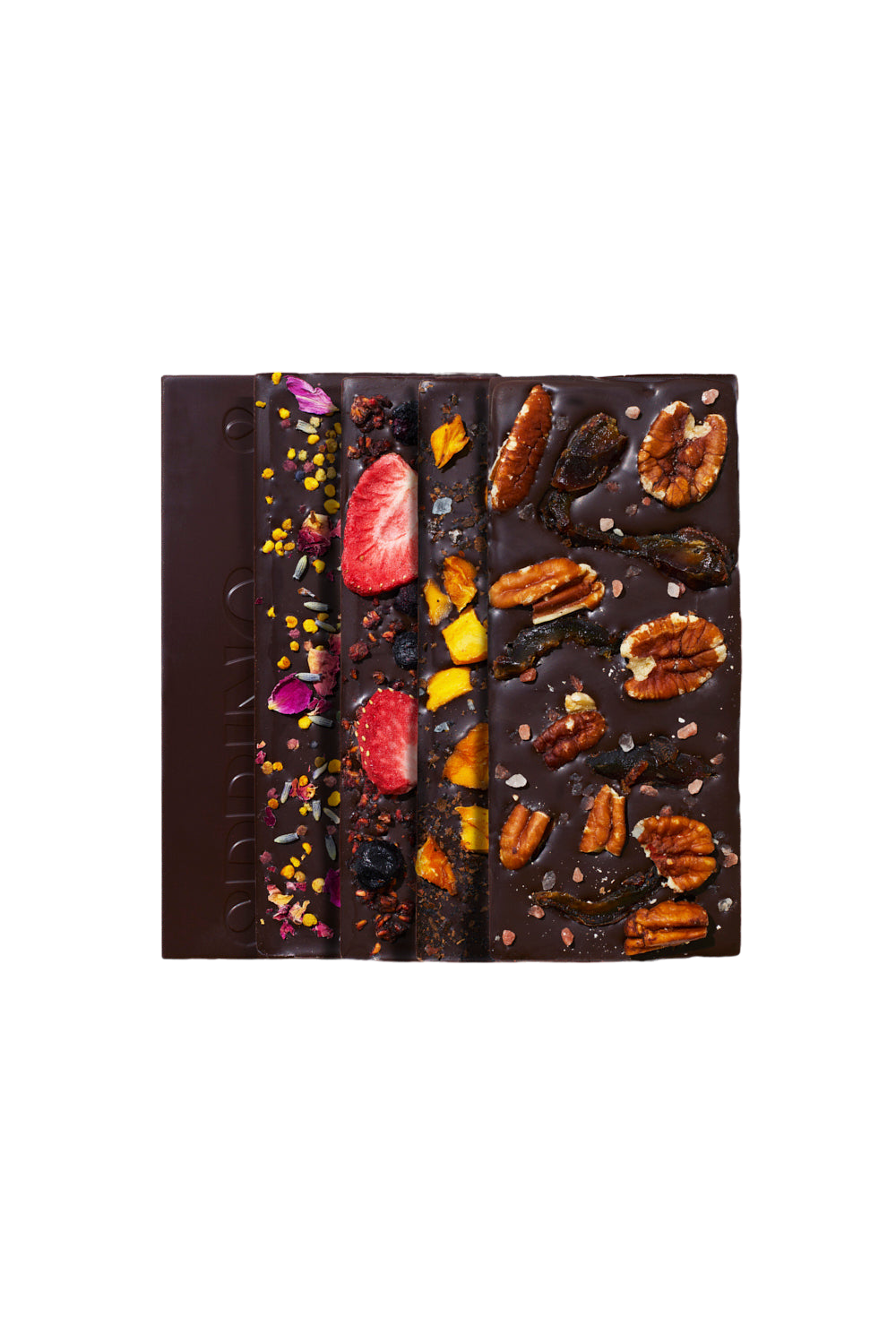 Discovery Collection chocolate bars by Spring & Mulberry are arranged vertically on a black background. Each date-sweetened bar is uniquely topped with various ingredients like nuts, dried fruits, and colorful garnishes, offering both deliciousness and nutritional value.