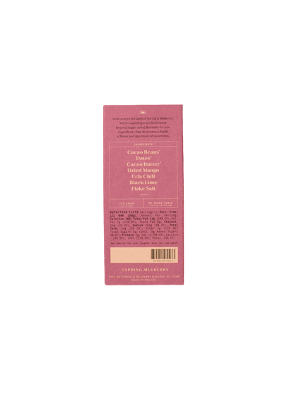 A pink wrapper for the Mango Chili Date-Sweetened Chocolate bar, showcasing its organic ingredients such as cacao beans, cacao butter, date-sweetened dried mango, pink salt, black lime, and flake salt. 