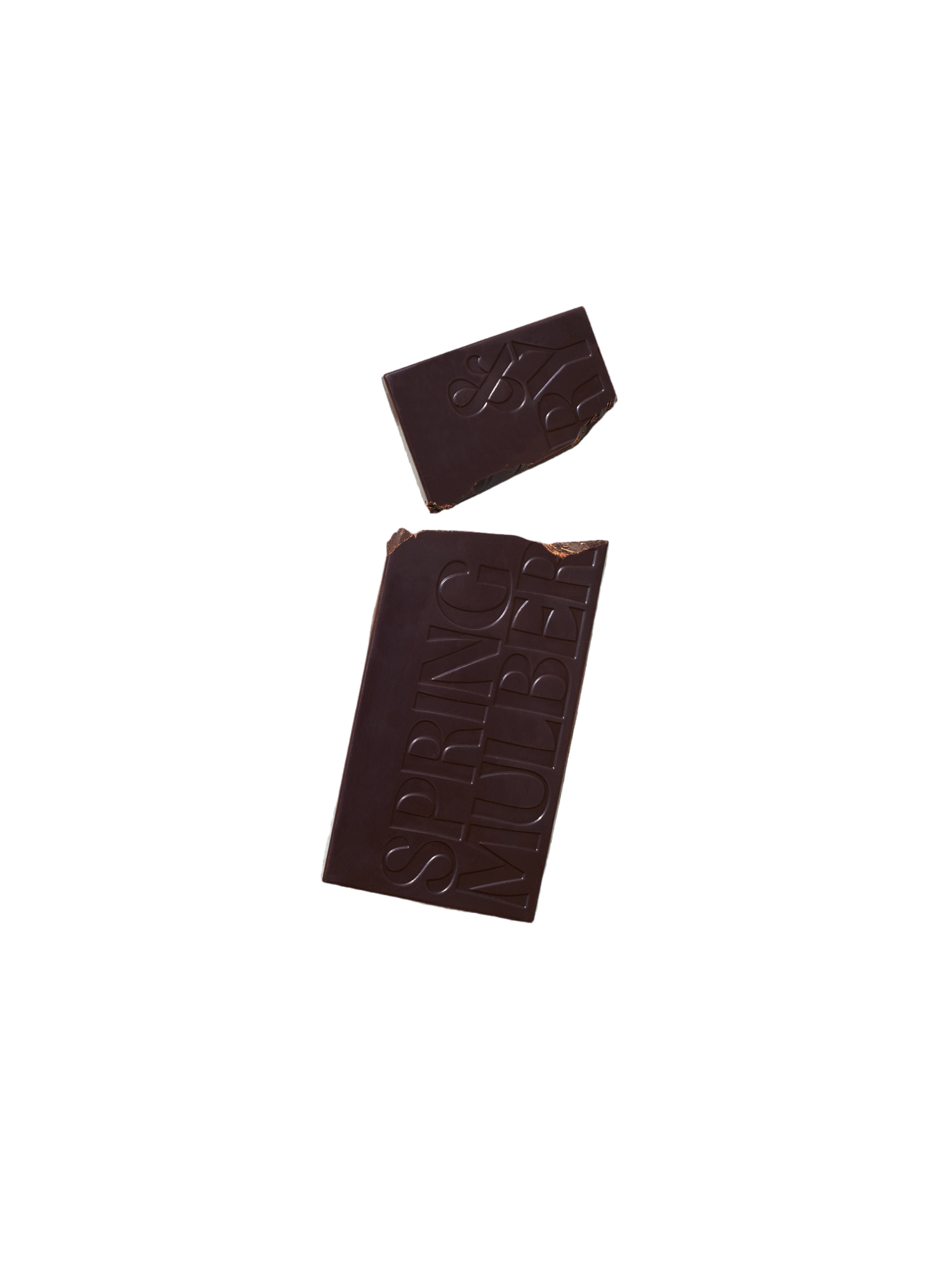 A bar of Pure Dark Date-Sweetened Chocolate with a small broken-off piece on a black background. The larger section of the chocolate bar has the words "Spring & Mulberry" embossed on it, showcasing its rich, date-sweetened chocolate origin.