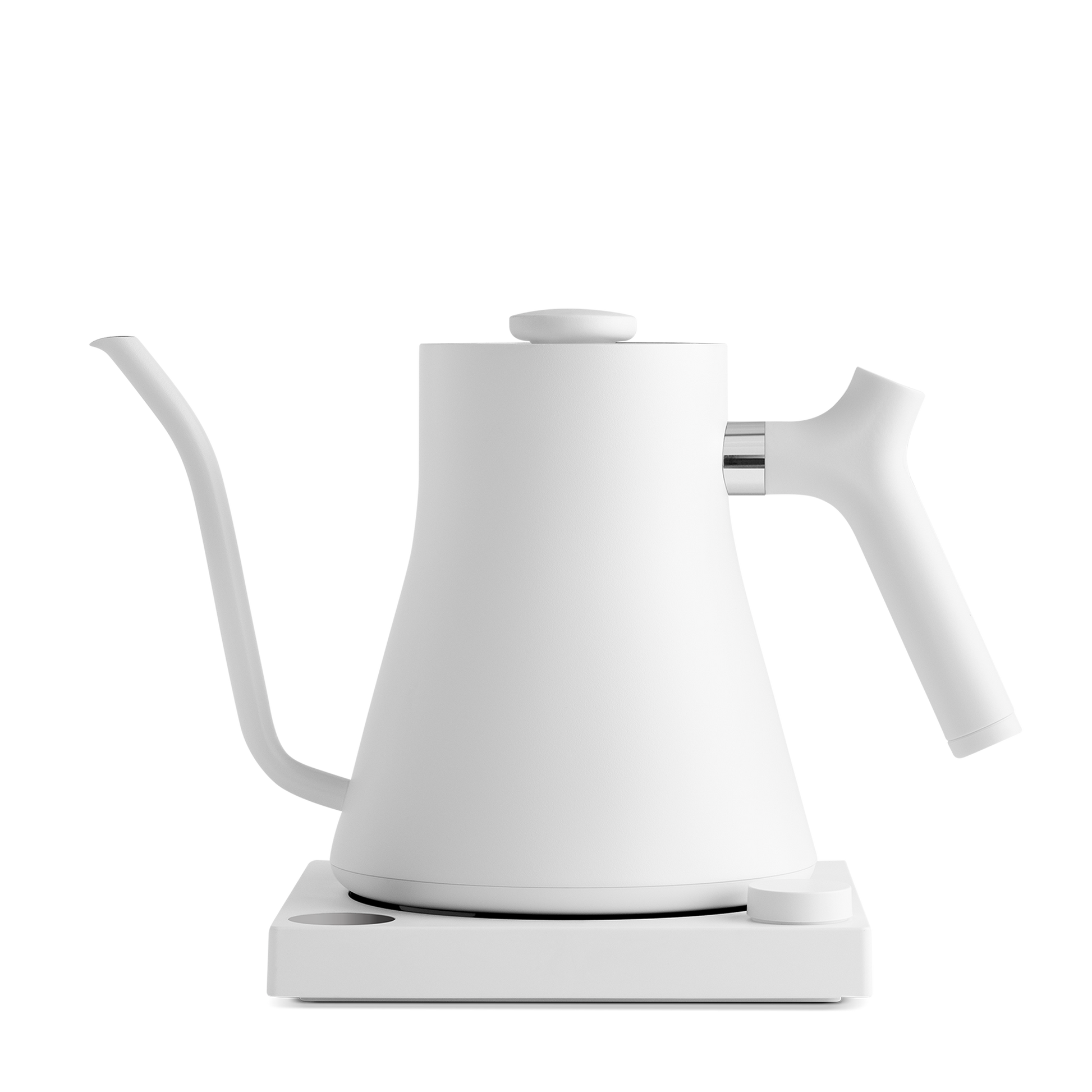 The Stagg EKG Electric Kettle from Fellow Wholesale is a sleek, modern white pour-over kettle featuring a precise gooseneck spout and an ergonomic handle, elegantly positioned on its base. This kettle boasts a minimalist design, variable temperature control, and a matte finish.