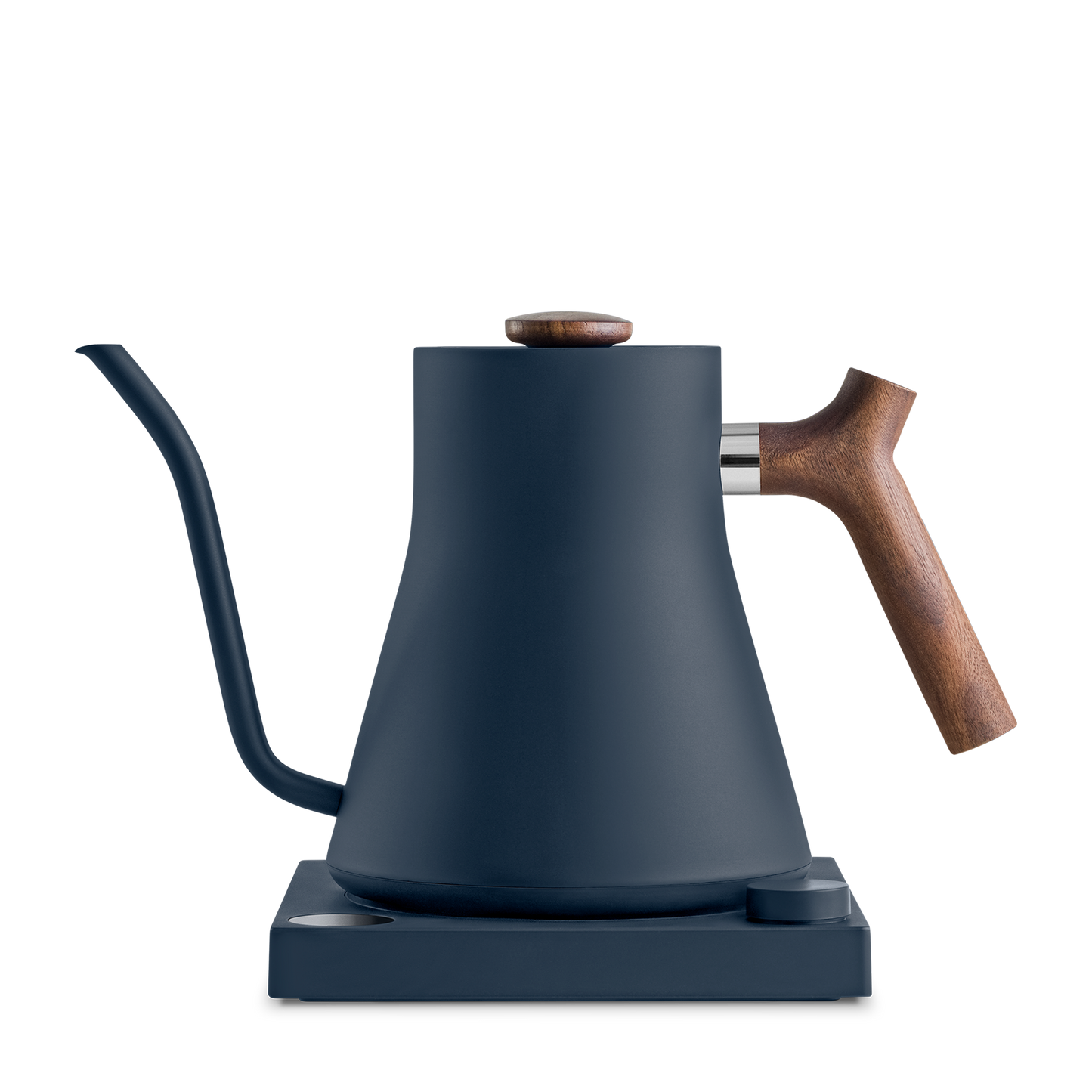 A matte black Stagg EKG Electric Kettle from Fellow Wholesale, featuring a wooden handle and a gooseneck spout, rests on its matching base. The minimalist and modern design seamlessly combines metal and wood elements, offering a sleek, functional appearance along with variable temperature control for perfect brewing precision.