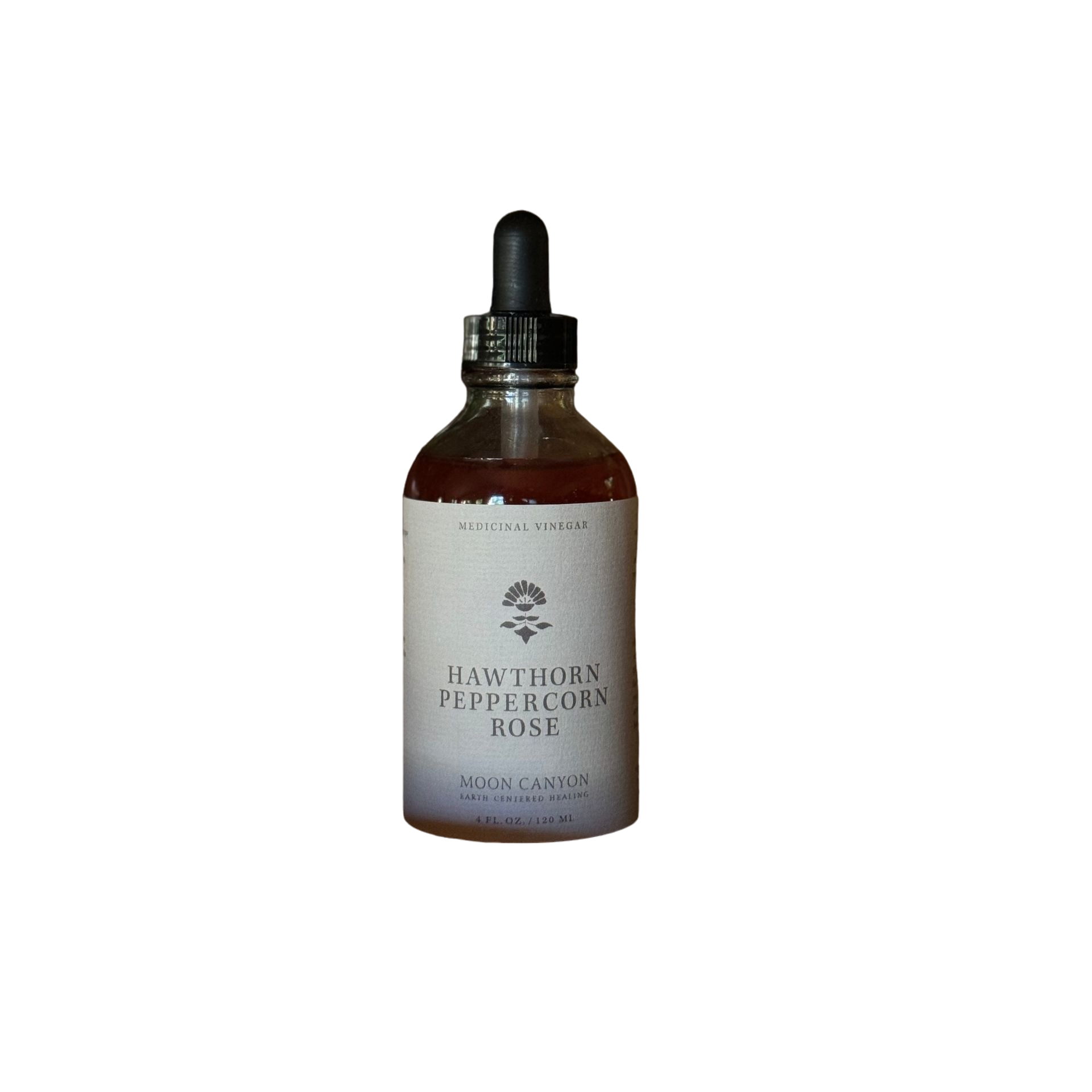 A glass bottle with a dropper lid containing a liquid labeled "Hawthorn, Peppercorn & Rose Vinegar" from Moon Canyon Healing. This herb-infused vinegar, known for its antioxidants, features a minimalist design with a light gray gradient background and a small logo of a branch with leaves.