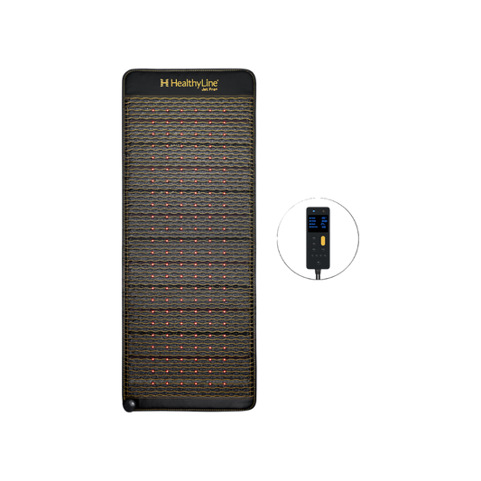 The Jet Mat Full Pro PLUS 7428 Firm Photon PEMF InfraMat Pro® by HealthyLine is a black infrared heating mat with a textured surface, featuring embedded natural gemstones. To the right of the mat, there's a separate black digital controller with a screen and buttons.