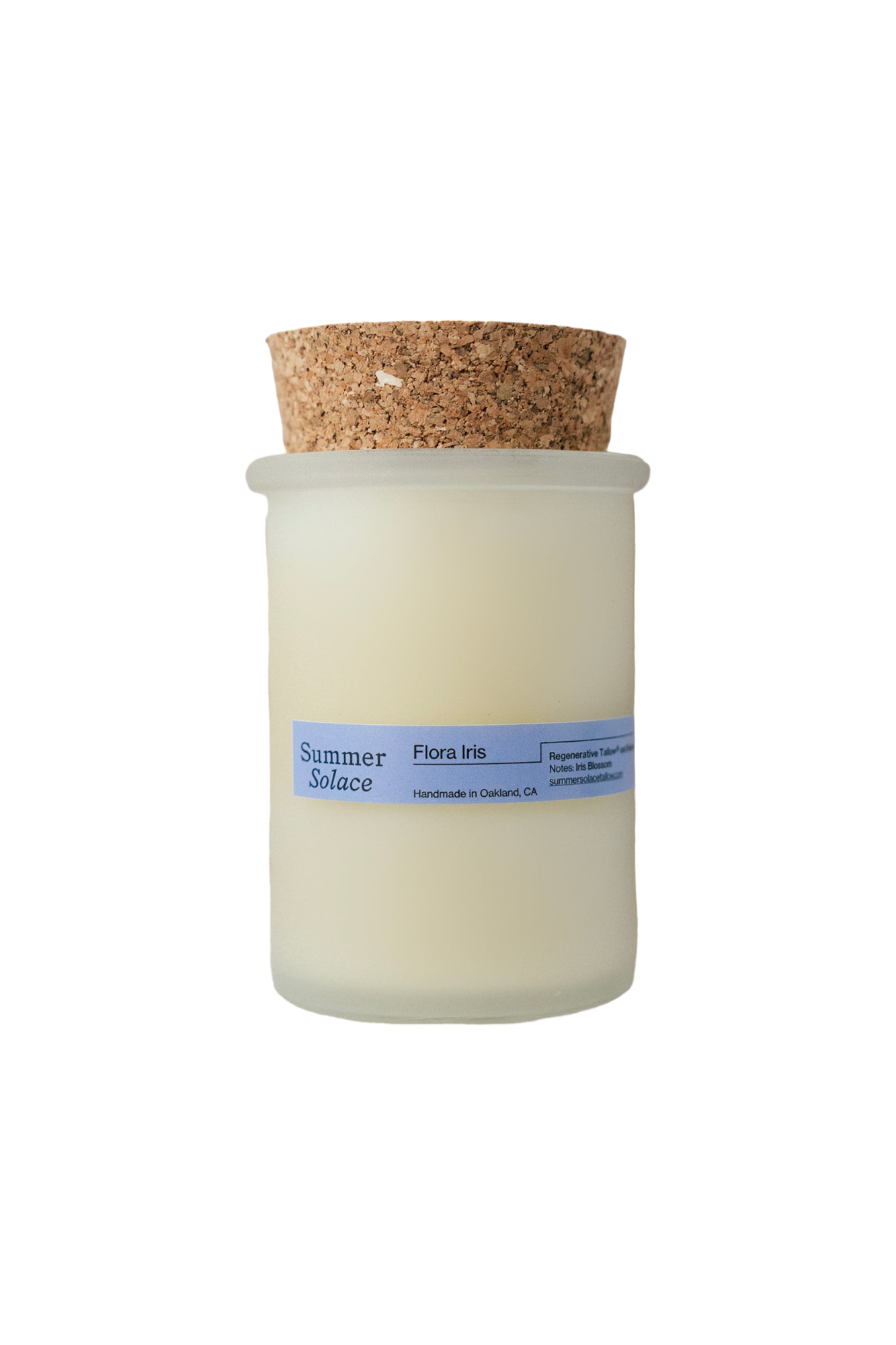 A frosted glass jar candle with a cork lid, featuring a light blue label that reads "Summer Solace Tallow" and "Flora Iris Candle - Regenerative Tallow™." It is handmade in Oakland, CA. The cream-colored wax ensures the sustainable tallow candles feel luxurious.