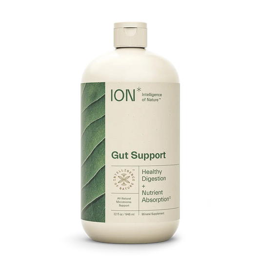 A white bottle labeled "ION* Gut Support" with a leaf design on the left side. The label states "Healthy Digestion + Nutrient Absorption" and highlights "All Natural Microbiome Support." This daily wellness supplement by ION* contains 32 fl oz (946 ml) of mineral support for optimal gut health.