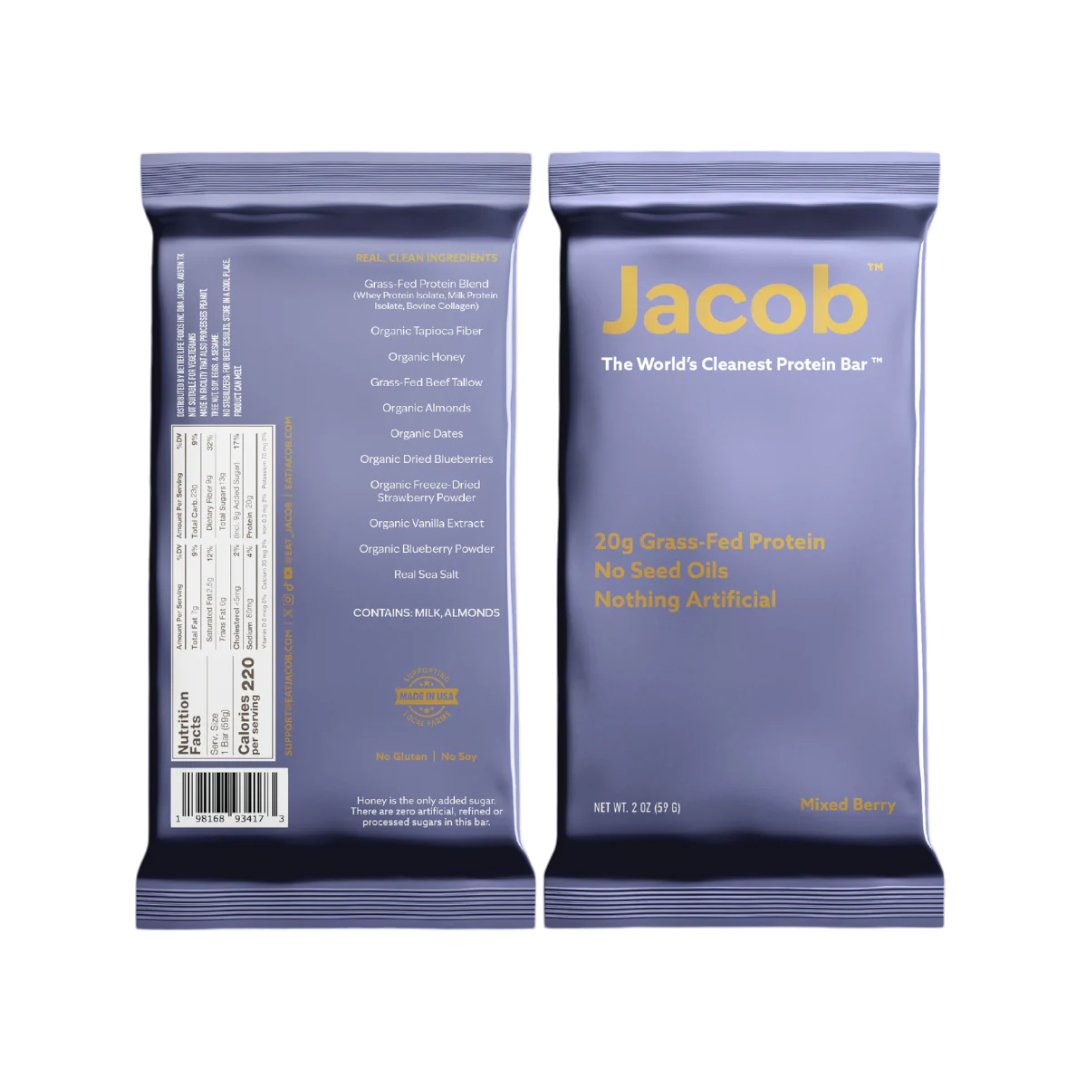 Two packages of The Jacob Bar by Jacob Bar, featuring purple and silver packaging, are labeled "The World's Cleanest Protein Bar." Each protein bar offers 20g of grass-fed whey protein with organic honey and is free from seed oils. The flavor is Muddled Berry, and the ingredients alongside the nutritional information are visible.