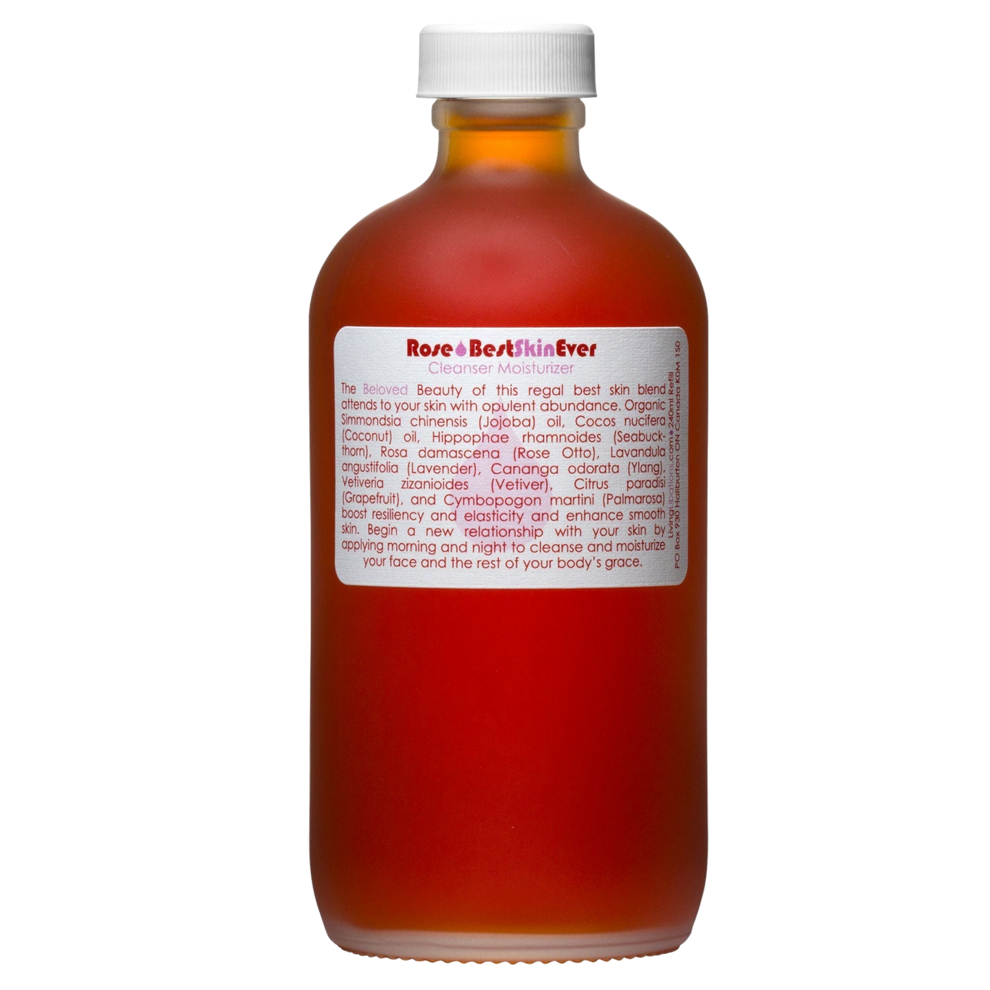 A brown frosted glass bottle with a white screw cap contains the Best Skin Ever Cleanser - Rose by Living Libations. The white label with red text displays the product name "Rose Otto BestSkinEver" and includes ingredients and usage instructions.