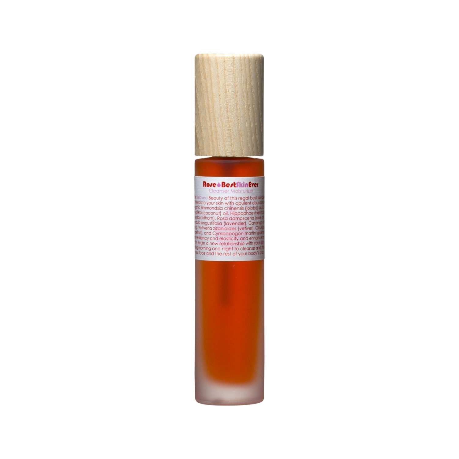 A small bottle containing an orange liquid with a wooden cap, featuring a label that has text which is difficult to read. The design of the bottle suggests it might contain Living Libations' Best Skin Ever Cleanser - Rose, renowned for its luxurious Rose Otto ingredient aimed at achieving the best skin ever.