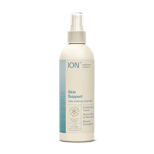 A white spray bottle labeled "ION* Skin Support" from the brand ION*. The bottle features blue and white text describing its purpose to protect against toxins, support the skin barrier, reduce the effects of skin irritants, and balance complexion. Contains 8 fluid ounces (236 mL).