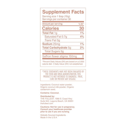 The supplement facts label for THE FULLEST's Warm Feelings® Saffron Latte - 30 Day Supply provides nutritional information for this caffeine-free beverage, including details about calories, fat, saturated fat, sodium, carbohydrates, sugars, and the inclusion of saffron flower stigma known to enhance mood. The ingredients listed on the label are coconut water powder, coconut milk powder, and cardamom seed.